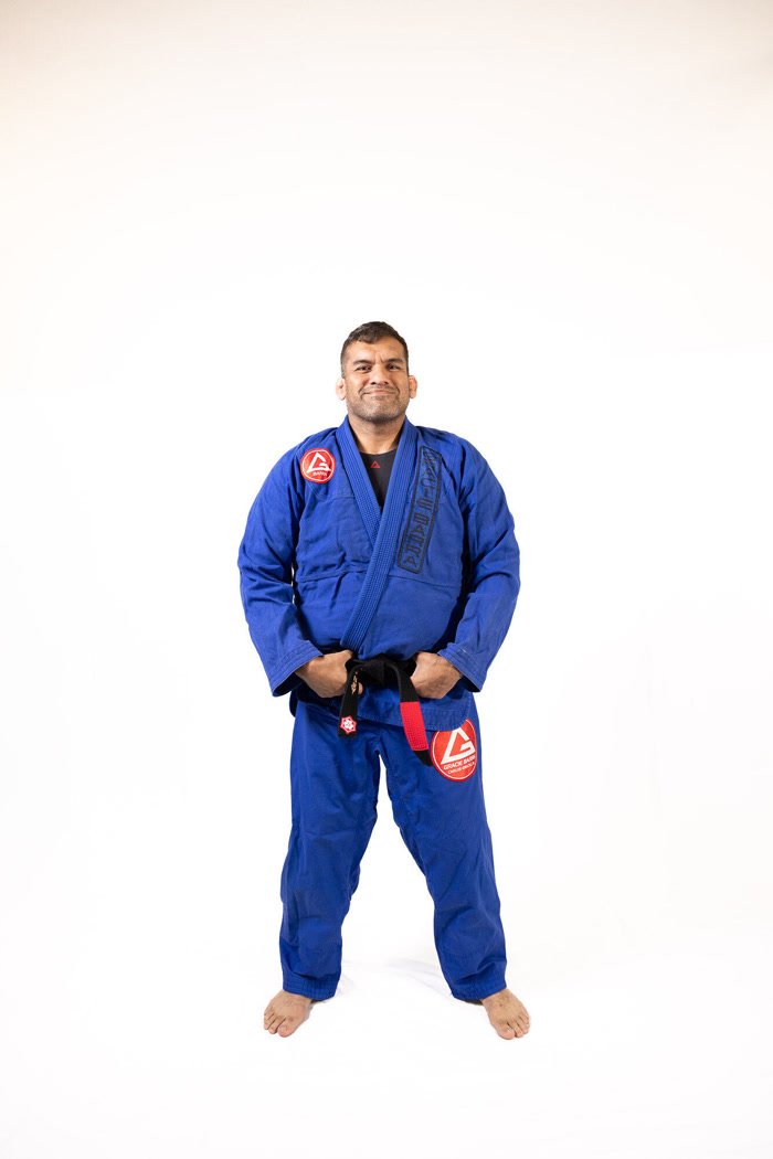 Professor Jose Ramirez in a white gi with a black belt